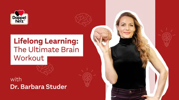 A woman holds a human brain model while standing against a red background. Text on the image reads "Lifelong Learning: The Ultimate Brain Workout" with "with Dr. Barbara Studer." Lightbulb icons are featured in the background, symbolizing ideas and knowledge.